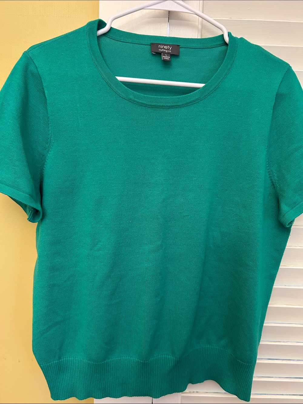 Ninety teal short sleeve knit top